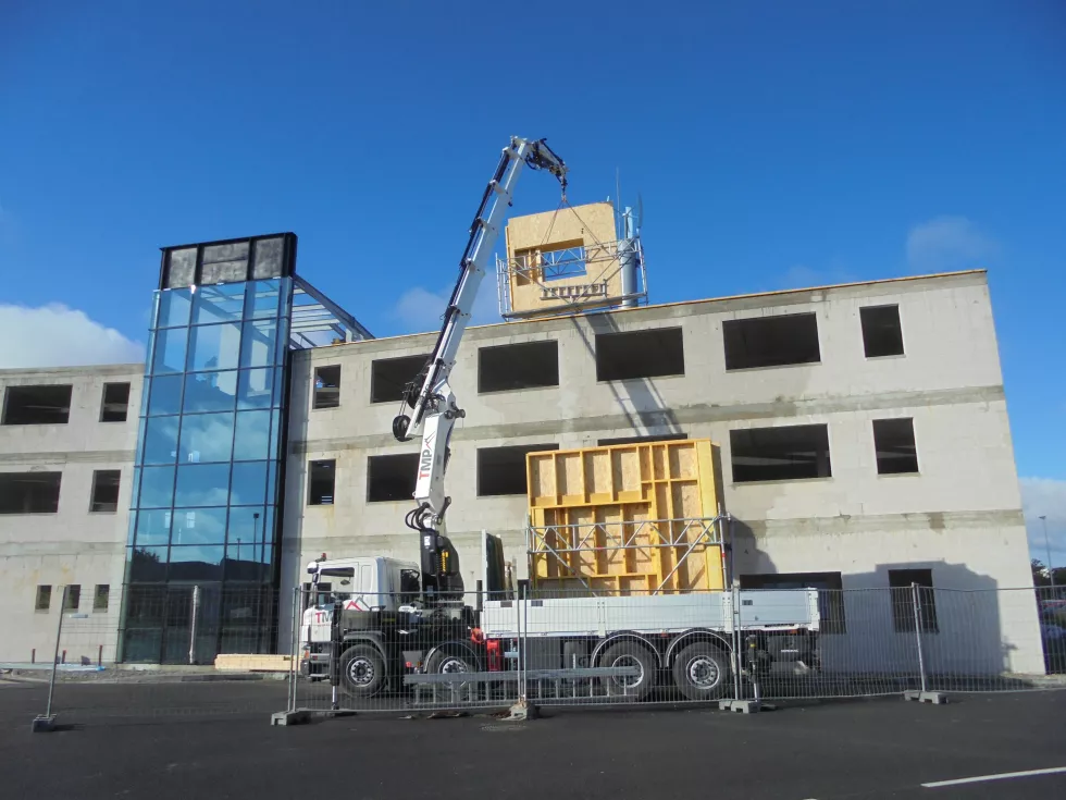 Dernière étage en ossature bois afin de réduire les coûts et contraintes de construction 